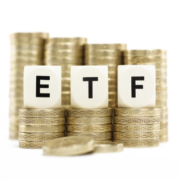 ETF with stacks of coins in the background
