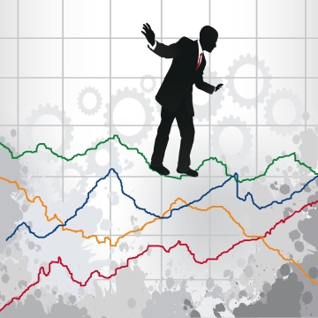 Man balancing on a line graph